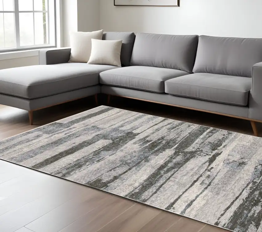 Gray And Ivory Abstract Area Rug With Fringe Photo 1