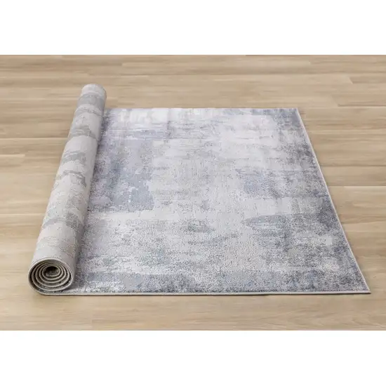 Gray And Ivory Abstract Area Rug Photo 9