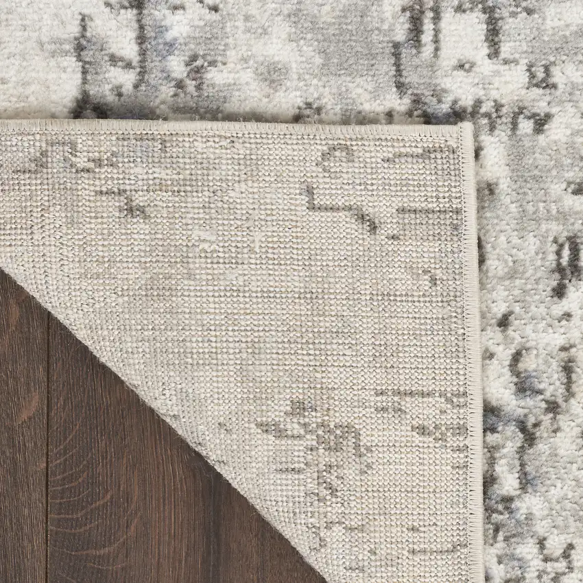 Gray And Ivory Abstract Area Rug Photo 9