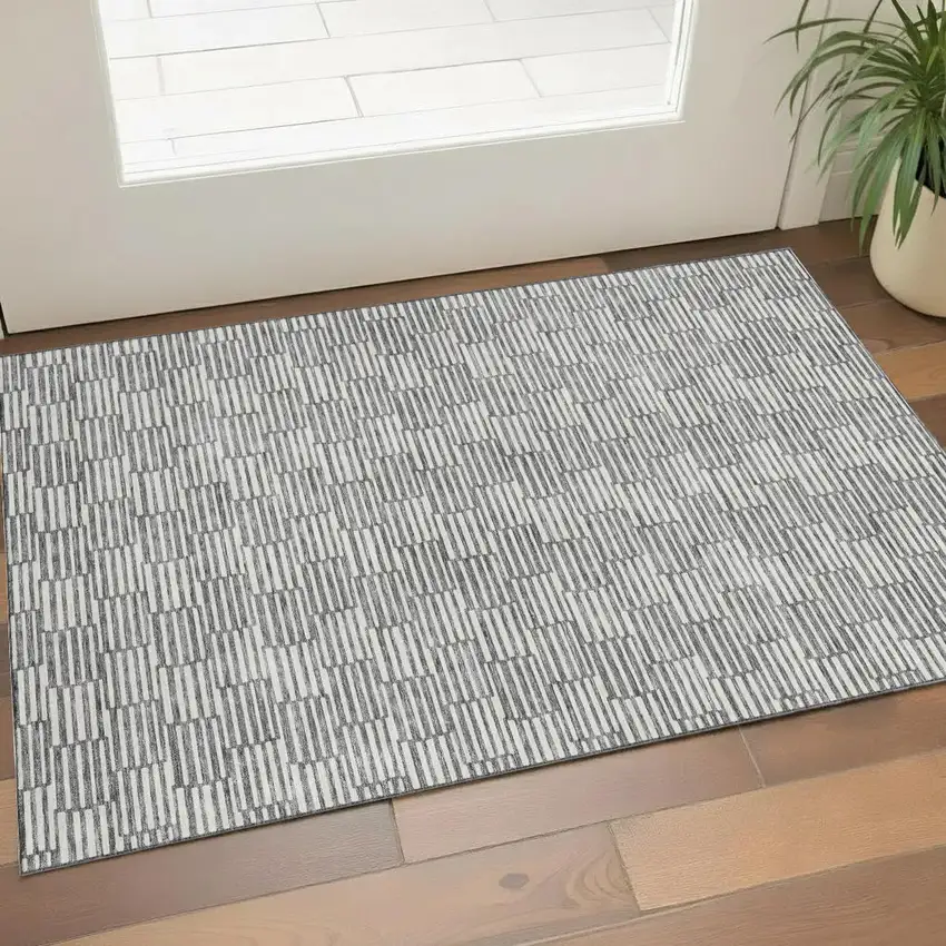 Gray And Ivory Abstract Geometric Washable Area Rug With UV Protection Photo 1