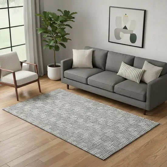 Gray And Ivory Abstract Geometric Washable Area Rug With UV Protection Photo 1