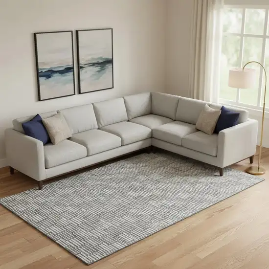 Gray And Ivory Abstract Geometric Washable Area Rug With UV Protection Photo 1