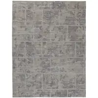 Photo of Gray And Ivory Abstract Hand Woven Area Rug