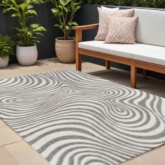 Gray And Ivory Abstract Indoor Outdoor Area Rug Photo 1
