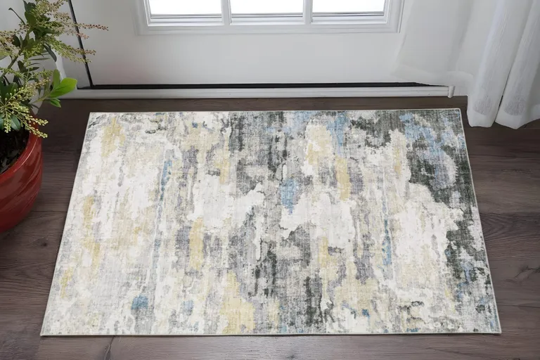 Gray And Ivory Abstract Printed Stain Resistant Non Skid Area Rug Photo 2