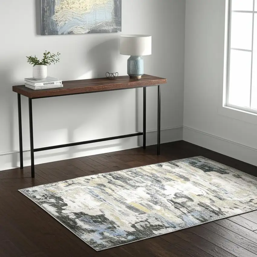 Gray And Ivory Abstract Printed Stain Resistant Non Skid Area Rug Photo 1