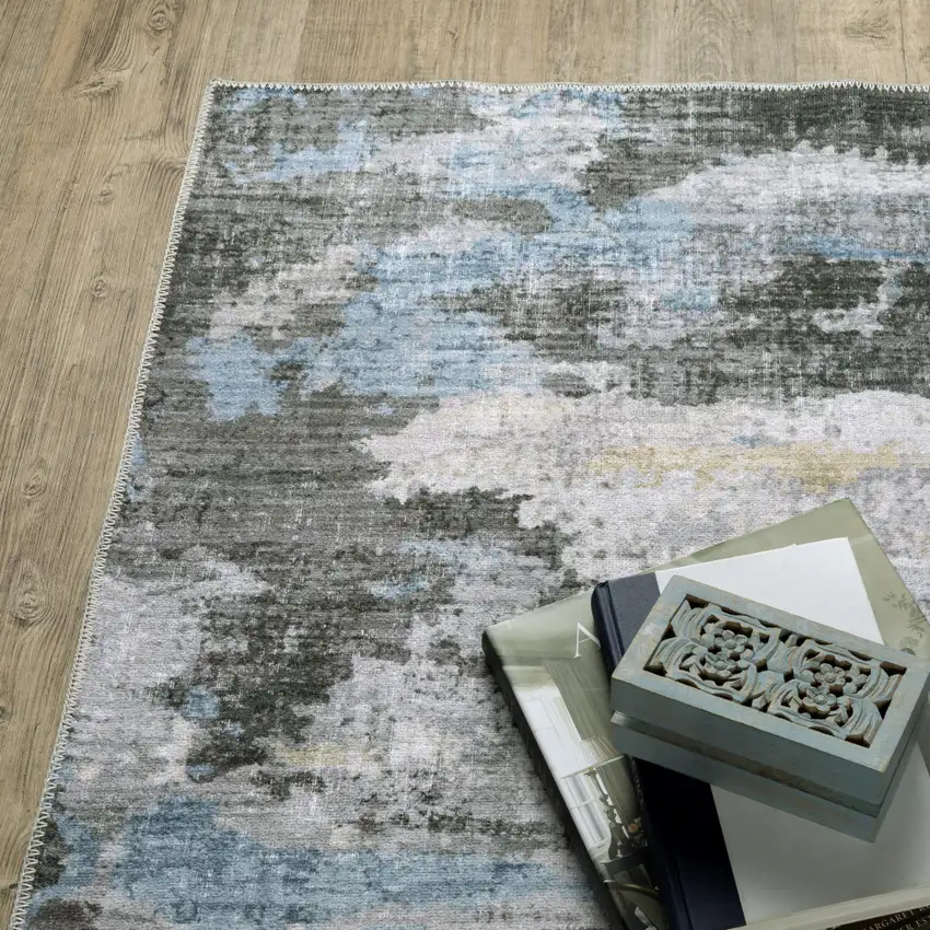 Gray And Ivory Abstract Printed Stain Resistant Non Skid Area Rug Photo 8