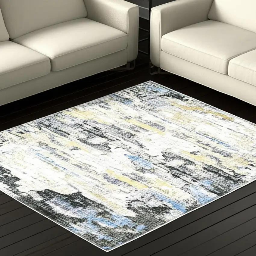 Gray And Ivory Abstract Printed Stain Resistant Non Skid Area Rug Photo 1