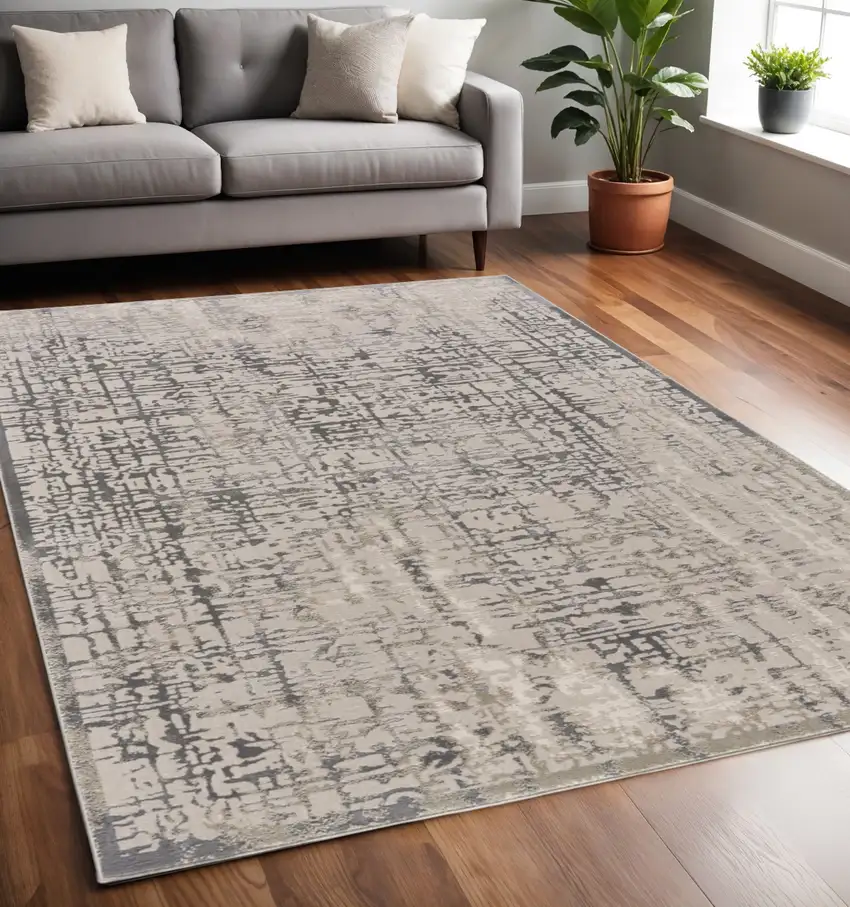 Gray And Ivory Abstract Stain Resistant Area Rug Photo 1