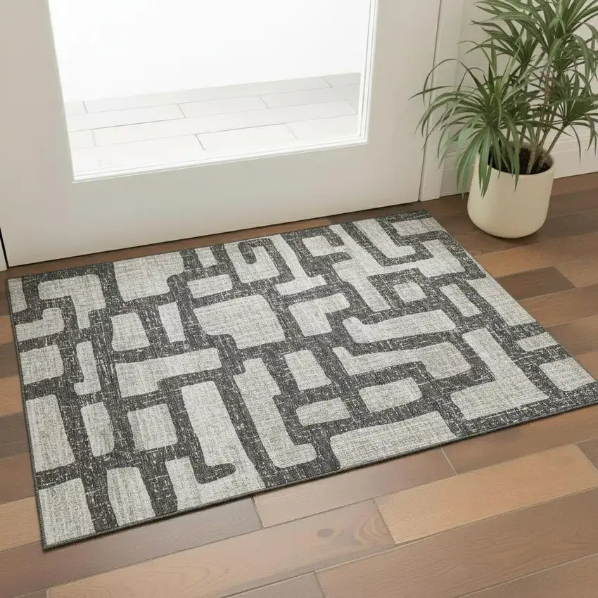 Gray And Ivory Abstract Washable Area Rug With UV Protection Photo 1