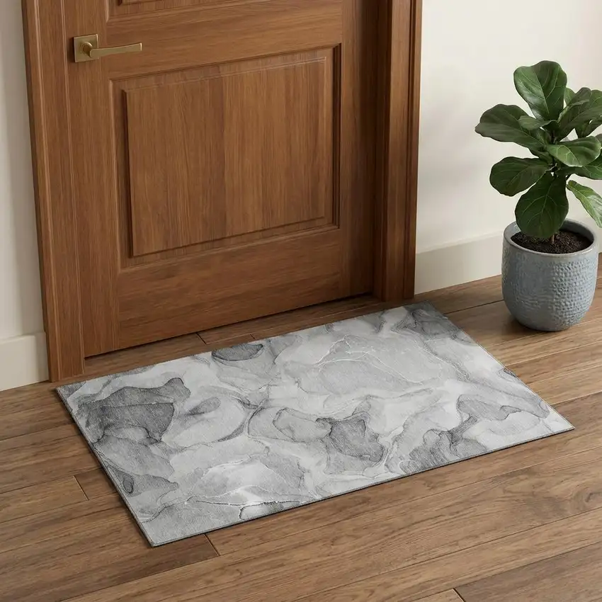 Gray And Ivory Abstract Washable Area Rug With UV Protection Photo 1
