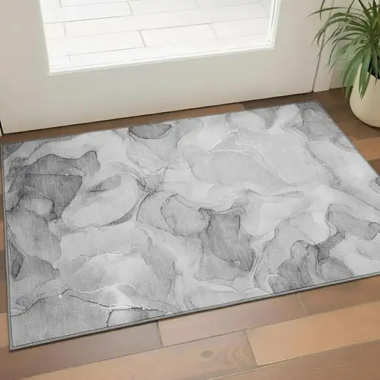 Gray And Ivory Abstract Washable Area Rug With UV Protection Photo 1