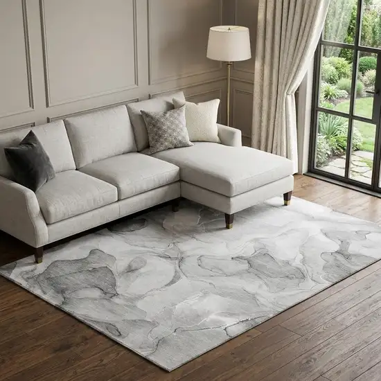 Gray And Ivory Abstract Washable Area Rug With UV Protection Photo 1