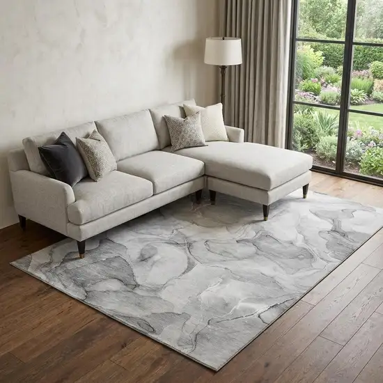 Gray And Ivory Abstract Washable Area Rug With UV Protection Photo 1