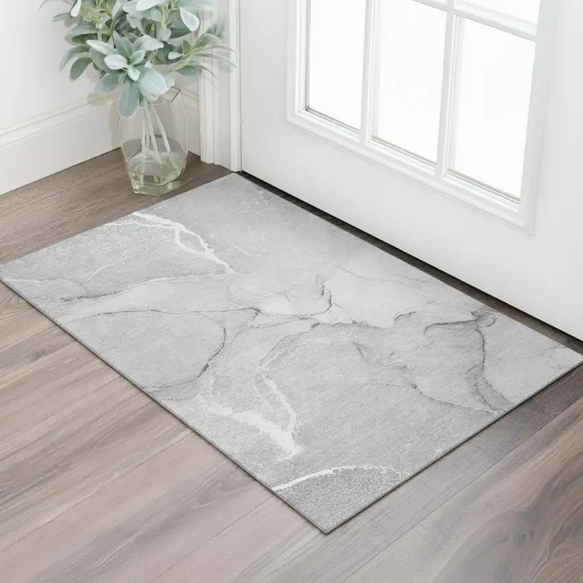 Gray And Ivory Abstract Washable Area Rug With UV Protection Photo 1