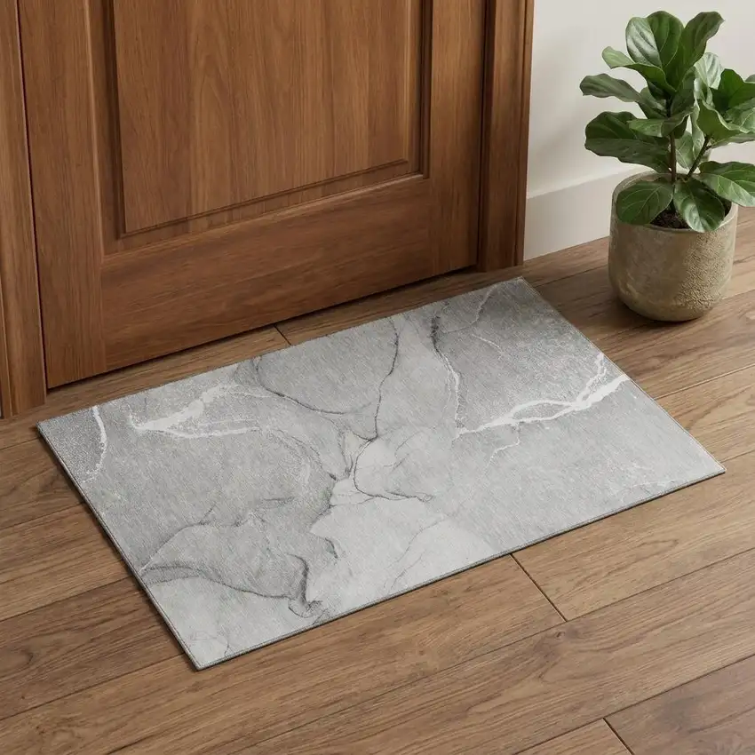 Gray And Ivory Abstract Washable Area Rug With UV Protection Photo 1