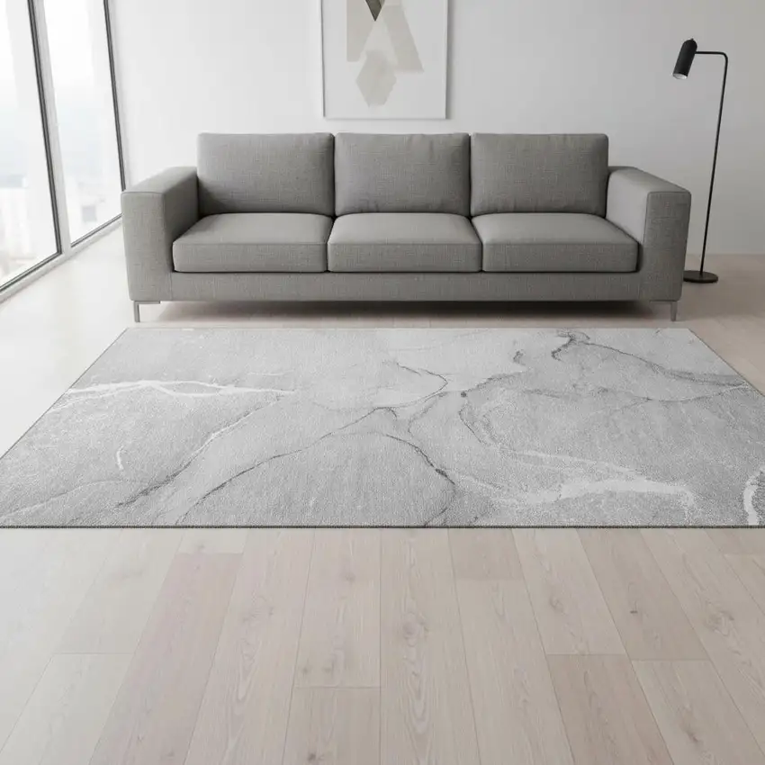 Gray And Ivory Abstract Washable Area Rug With UV Protection Photo 1