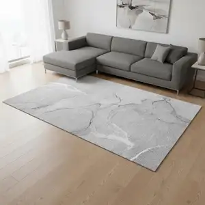 Photo of Gray And Ivory Abstract Washable Area Rug With UV Protection