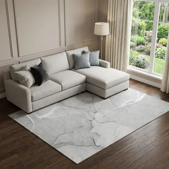 Gray And Ivory Abstract Washable Area Rug With UV Protection Photo 1