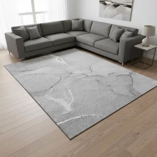 Gray And Ivory Abstract Washable Area Rug With UV Protection Photo 1