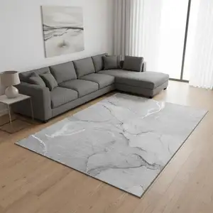 Photo of Gray And Ivory Abstract Washable Area Rug With UV Protection
