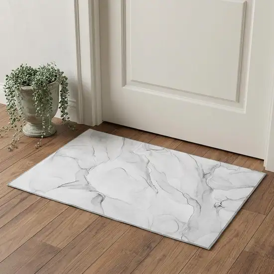 Gray And Ivory Abstract Washable Area Rug With UV Protection Photo 1