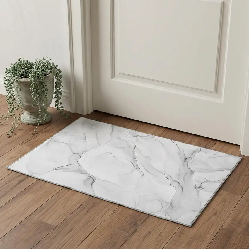 Gray And Ivory Abstract Washable Area Rug With UV Protection Photo 1