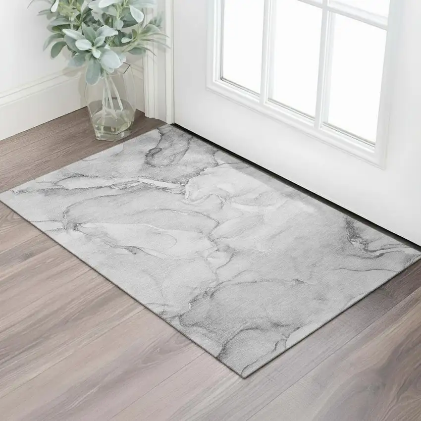 Gray And Ivory Abstract Washable Area Rug With UV Protection Photo 1