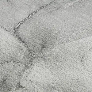 Photo of Gray And Ivory Abstract Washable Area Rug With UV Protection