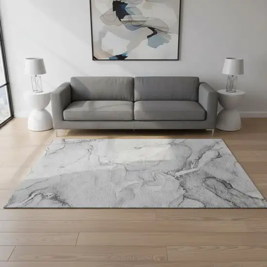 Gray And Ivory Abstract Washable Area Rug With UV Protection Photo 1