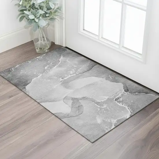 Gray And Ivory Abstract Washable Area Rug With UV Protection Photo 1