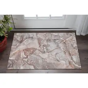 Photo of Gray And Ivory Abstract Washable Area Rug With UV Protection