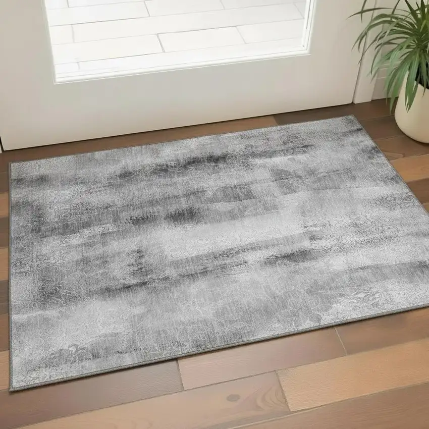 Gray And Ivory Abstract Washable Area Rug With UV Protection Photo 1