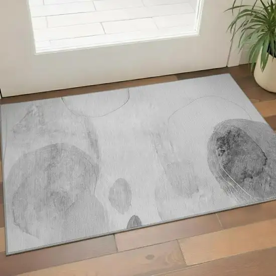 Gray And Ivory Abstract Washable Area Rug With UV Protection Photo 1