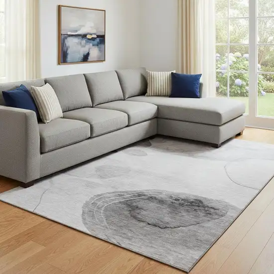 Gray And Ivory Abstract Washable Area Rug With UV Protection Photo 1