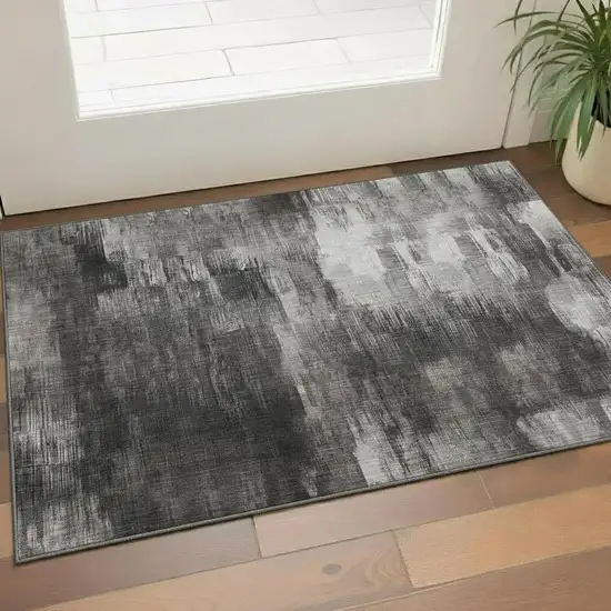 Gray And Ivory Abstract Washable Area Rug With UV Protection Photo 1