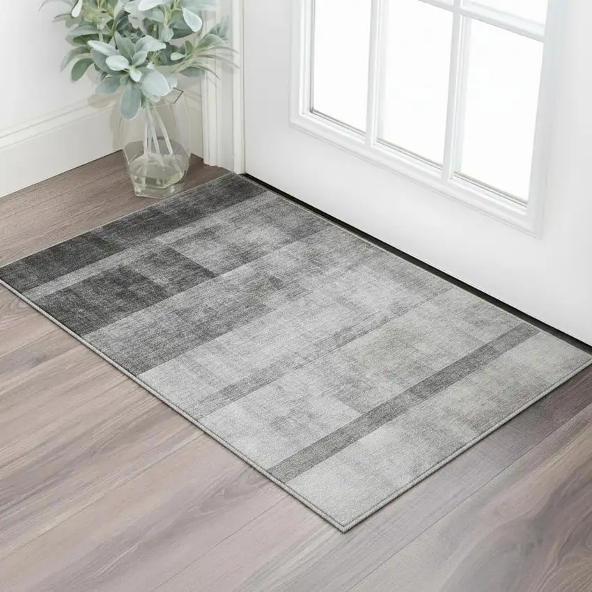 Gray And Ivory Abstract Washable Area Rug With UV Protection Photo 2