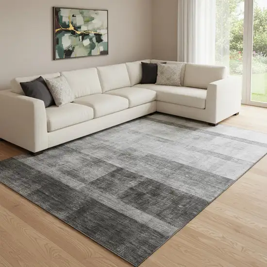 Gray And Ivory Abstract Washable Area Rug With UV Protection Photo 1