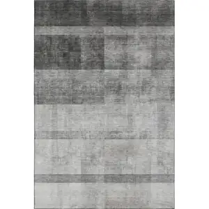 Photo of Gray And Ivory Abstract Washable Area Rug With UV Protection