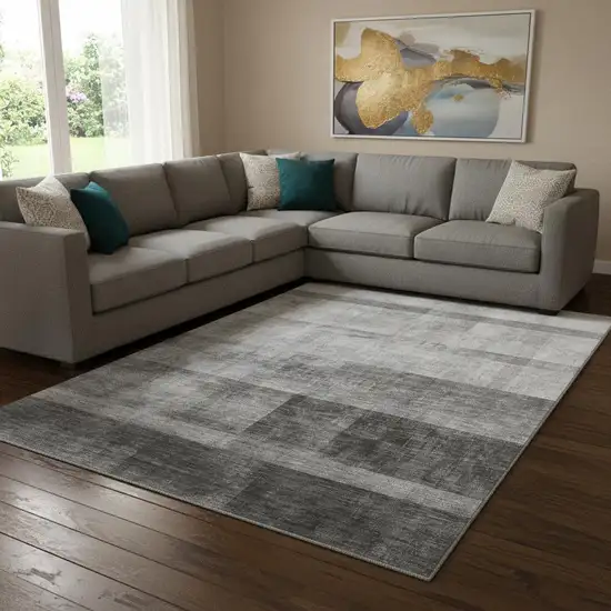 Gray And Ivory Abstract Washable Area Rug With UV Protection Photo 1