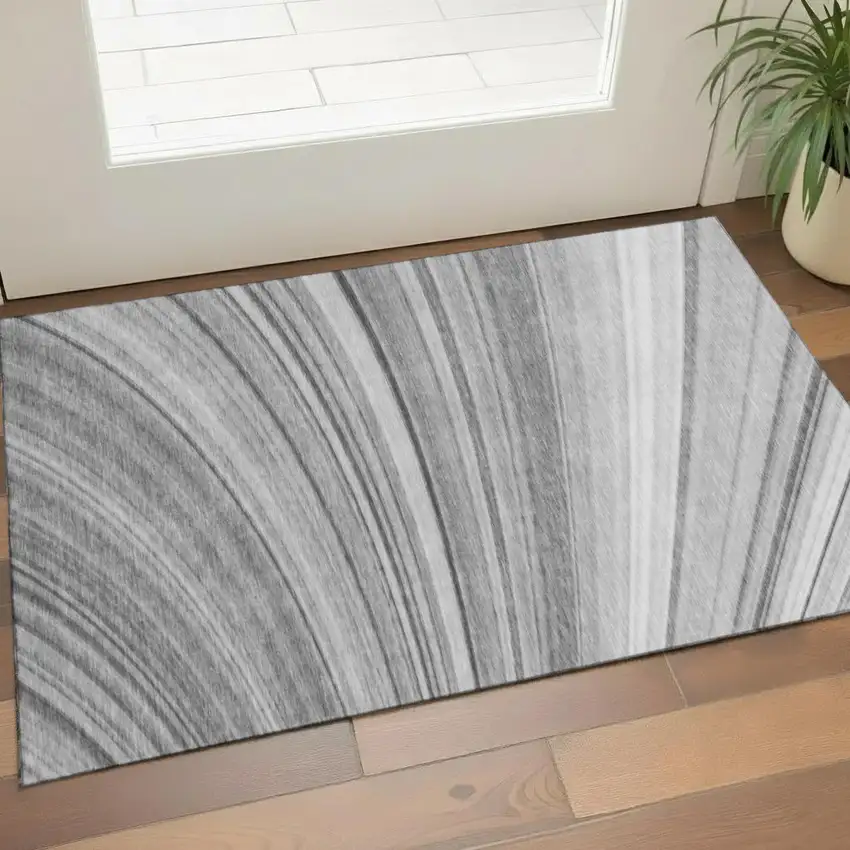 Gray And Ivory Abstract Washable Area Rug With UV Protection Photo 1