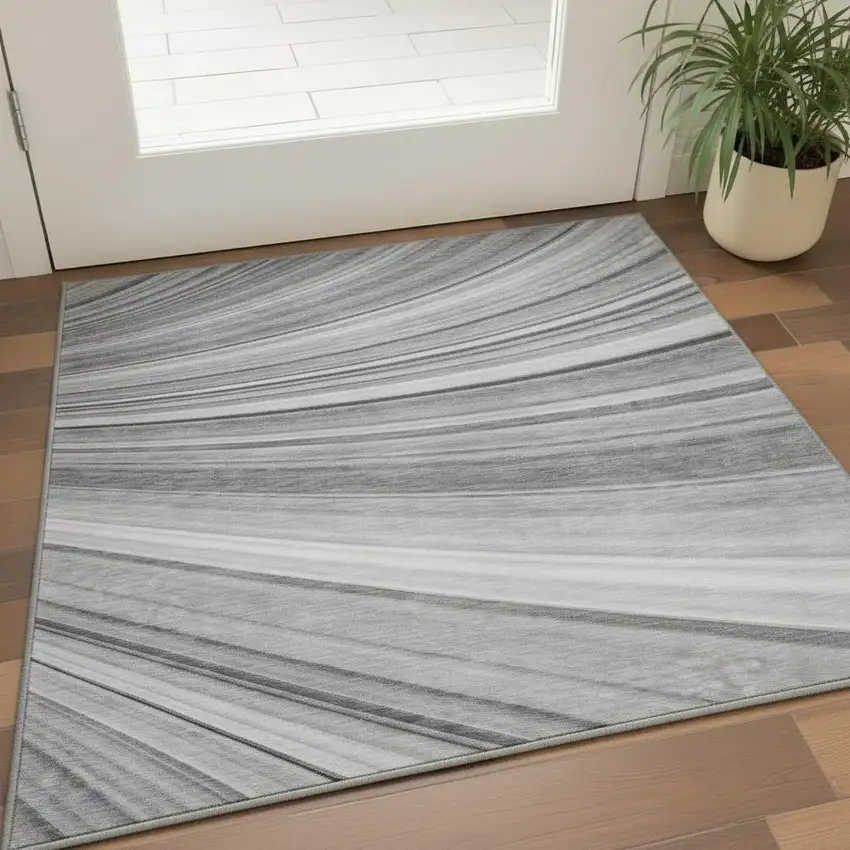 Gray And Ivory Abstract Washable Area Rug With UV Protection Photo 1