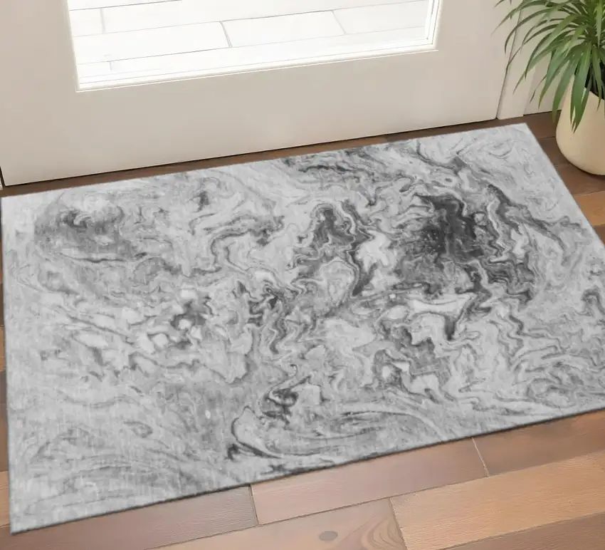 Gray And Ivory Abstract Washable Area Rug With UV Protection Photo 1