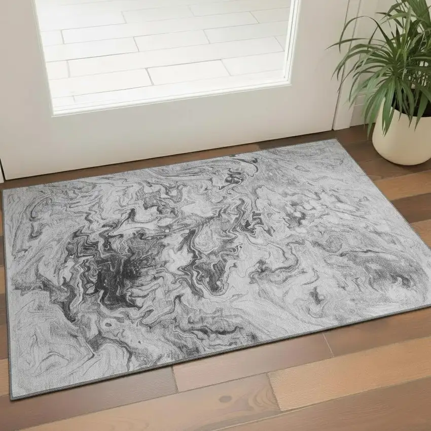 Gray And Ivory Abstract Washable Area Rug With UV Protection Photo 1