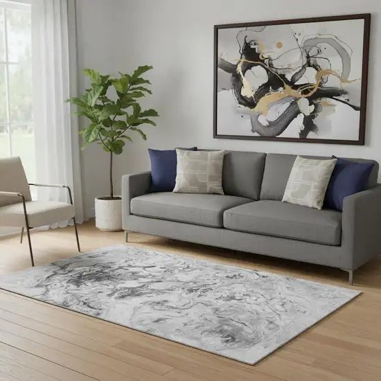 Gray And Ivory Abstract Washable Area Rug With UV Protection Photo 1