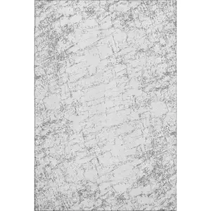 Photo of Gray And Ivory Abstract Washable Area Rug With UV Protection
