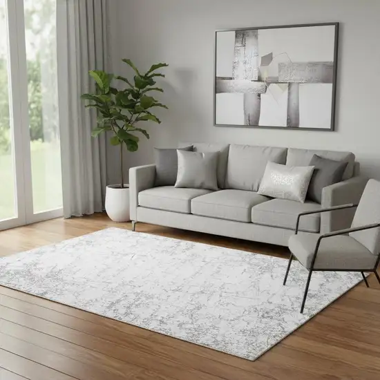Gray And Ivory Abstract Washable Area Rug With UV Protection Photo 1