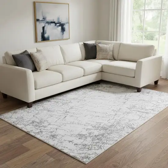 Gray And Ivory Abstract Washable Area Rug With UV Protection Photo 1