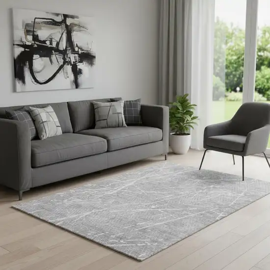 Gray And Ivory Abstract Washable Area Rug With UV Protection Photo 1