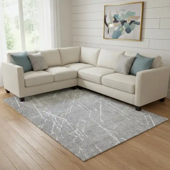 Gray And Ivory Abstract Washable Area Rug With UV Protection Photo 1